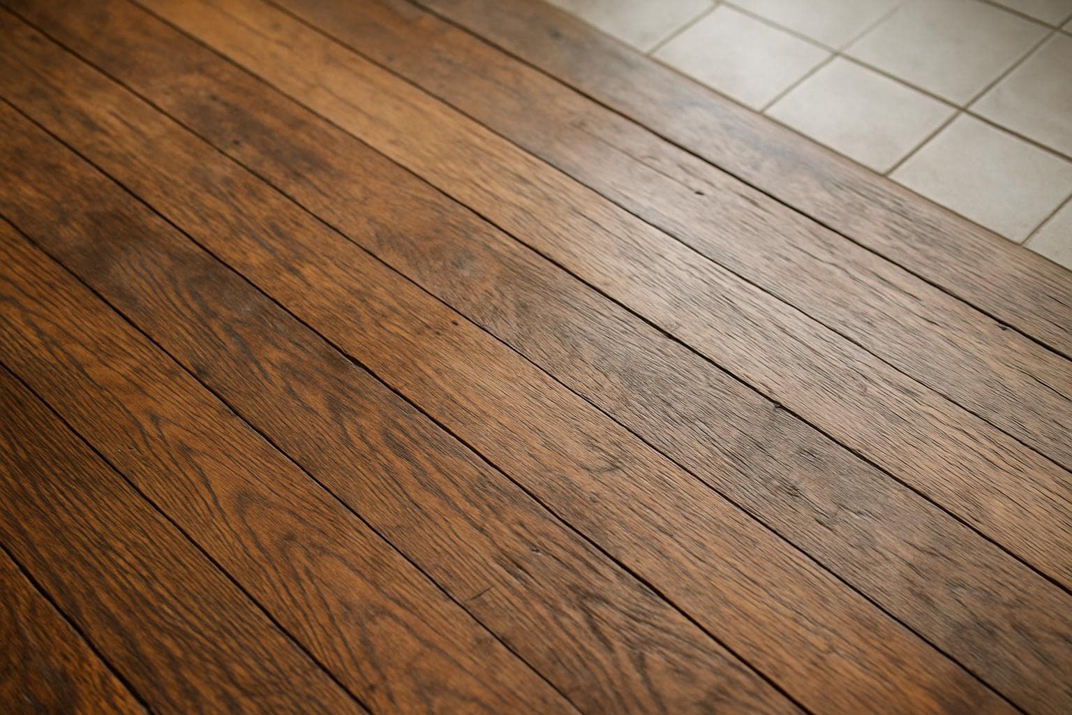 Aged hardwood floor showing years of wear and natural patina