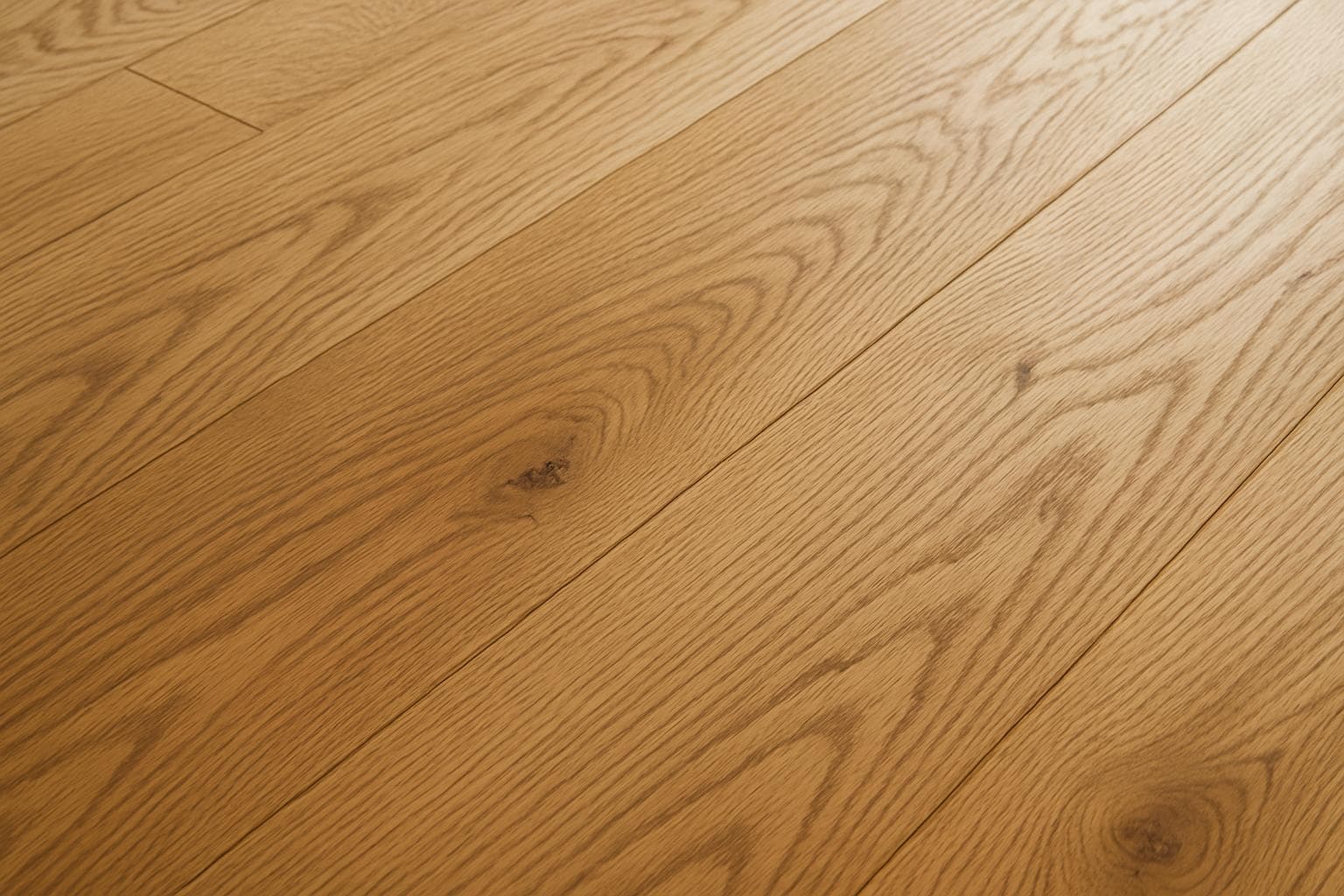 Close-up of oak wood grain texture used in hardwood flooring